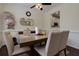 Cozy dining room features neutral tones, stylish light fixture, and direct kitchen access at 2700 Ridge Run Tr Trl, Duluth, GA 30097