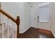 Bright entryway showcasing hardwood floors, staircase, and white trim, creating a welcoming and elegant atmosphere at 2700 Ridge Run Tr Trl, Duluth, GA 30097