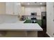 Charming kitchen with quartz countertops, stainless steel appliances, and ample cabinet space at 2700 Ridge Run Tr Trl, Duluth, GA 30097