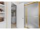 Elegant bathroom view featuring a doorway and a glass shower, showcasing serene design elements at 300 Brayward Chase, Roswell, GA 30076