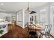 Breakfast area adjacent to the kitchen with a round table and black chairs, bathed in natural light at 300 Brayward Chase, Roswell, GA 30076