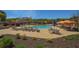 Community pool area with comfortable lounge seating, mature landscaping, and well-maintained brick pavers, offering a relaxing outdoor space at 300 Brayward Chase, Roswell, GA 30076