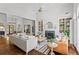 Inviting living room with fireplace, hardwood floors, built-in shelving, and plenty of natural light at 300 Brayward Chase, Roswell, GA 30076