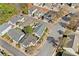 An aerial view of a residential neighborhood showcasing the layout and proximity of homes at 1228 W Oaks Way, Woodstock, GA 30188