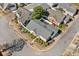 Aerial view of a well-maintained home with landscaped surroundings at 1228 W Oaks Way, Woodstock, GA 30188