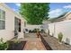 Private backyard with a patio area perfect for outdoor entertaining and relaxation at 1228 W Oaks Way, Woodstock, GA 30188