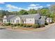 A charming single-story home with manicured landscaping, set in a peaceful neighborhood at 1228 W Oaks Way, Woodstock, GA 30188