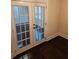 Entryway featuring double french doors with a window grid and dark wood flooring at 3268 Mae Ave, Brookhaven, GA 30319