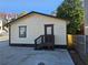 Side view of this charming bungalow with a fenced yard and greenery at 3268 Mae Ave, Brookhaven, GA 30319