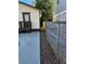 A narrow pathway alongside the home, bordered by a wooden fence at 3268 Mae Ave, Brookhaven, GA 30319