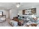 A bright living room with stylish decor, large windows, and comfortable seating at 6102 Marigold Way, Atlanta, GA 30349