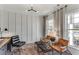 Well-lit office space with modern furniture, large windows, and stylish decor creating an inviting workspace at 6102 Marigold Way, Atlanta, GA 30349