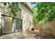 View of backyard with sliding door and air conditioning unit at 1401 Parkaire Xing, Marietta, GA 30068
