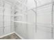Walk-in closet features adjustable white shelving at 1401 Parkaire Xing, Marietta, GA 30068