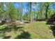 Large wooded back yard with mature trees allows plenty of space for recreation at 230 Oakridge Se Dr, Cartersville, GA 30121