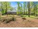 Large wooded back yard shows spaciousness of property and ample privacy from neighbors at 230 Oakridge Se Dr, Cartersville, GA 30121