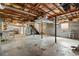 An unfinished basement featuring exposed utilities, and concrete floors and walls at 230 Oakridge Se Dr, Cartersville, GA 30121