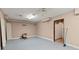 Finished basement space with painted walls, closet, and adjacent unfinished space offers versatility and extra storage at 230 Oakridge Se Dr, Cartersville, GA 30121