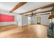 Spacious living room features wooden beams, fireplace and hardwood floors at 230 Oakridge Se Dr, Cartersville, GA 30121