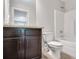 This bathroom features a tiled floor, granite countertop vanity and combination shower and tub at 237 Lotus Ln, Covington, GA 30016