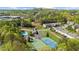 Community with a pool, tennis and basketball courts, surrounded by nature at 1439 Brookmere Way, Cumming, GA 30040