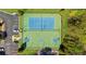 Aerial view of tennis and basketball courts and nearby parking at 1439 Brookmere Way, Cumming, GA 30040