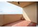Private balcony with terracotta tile flooring, offering a relaxing outdoor space at 1501 Clairmont Rd # 1818, Decatur, GA 30033