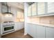 Bright kitchen with white cabinetry, stainless steel appliances, and ample counter space at 1501 Clairmont Rd # 1818, Decatur, GA 30033