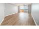 Bright living room featuring modern flooring and sliding glass doors to a balcony with scenic views at 1501 Clairmont Rd # 1818, Decatur, GA 30033