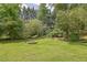 Private backyard oasis with a fire pit and a hammock at 1760 Commonwealth Trl, Cumming, GA 30041