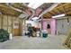 Unfinished basement featuring a concrete floor, exposed ducts, and storage areas, offering customizable potential at 1760 Commonwealth Trl, Cumming, GA 30041