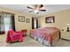 Bedroom with large bed and unique decor at 1760 Commonwealth Trl, Cumming, GA 30041