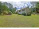 Charming two-story home with beautiful landscaping and a well-manicured lawn at 1760 Commonwealth Trl, Cumming, GA 30041