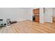 Partially finished basement area with bar area and plank flooring at 1045 Westcroft Ln, Roswell, GA 30075