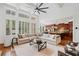 Spacious living room with high ceilings, large windows, and an open layout at 1045 Westcroft Ln, Roswell, GA 30075