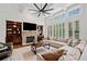 Inviting living room featuring a fireplace, shelving, and an open-concept design at 1045 Westcroft Ln, Roswell, GA 30075