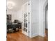 Bright office space featuring hardwood floors and an open doorway at 1045 Westcroft Ln, Roswell, GA 30075