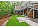 Spacious backyard featuring green grass, walkout basement and lots of privacy at 1250 Northcliff Trce, Roswell, GA 30076
