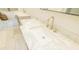 Bathroom featuring double sink vanity with marble countertop and white sink at 1250 Northcliff Trce, Roswell, GA 30076