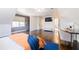 Bright bedroom boasts hardwood floors, a dedicated workspace, and a large window for natural light at 1250 Northcliff Trce, Roswell, GA 30076