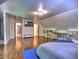 Spacious bedroom features hardwood floors, built-in shelving and vaulted ceiling at 1250 Northcliff Trce, Roswell, GA 30076
