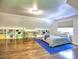 Spacious bedroom has hardwood floors, vaulted ceiling and built-in shelving at 1250 Northcliff Trce, Roswell, GA 30076