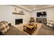 Cozy living room with couches, fireplace, television and carpeted floors at 1250 Northcliff Trce, Roswell, GA 30076