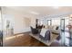 Bright living room featuring fireplace, hardwood floors, and access to the rear deck at 1250 Northcliff Trce, Roswell, GA 30076