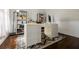 Home office with custom desk, decorative rug, and shelving for storage at 1250 Northcliff Trce, Roswell, GA 30076