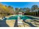 Large outdoor community pool with diving board and trees in the background at 1250 Northcliff Trce, Roswell, GA 30076