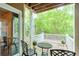 This outdoor patio area has forest views and privacy fencing at 2120 River Heights Se Walk, Marietta, GA 30067