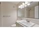 Bathroom with white cabinets, modern fixtures, large mirror, and shower at 2120 River Heights Se Walk, Marietta, GA 30067