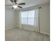 Bright bedroom with neutral walls, carpet, ceiling fan, and window at 2120 River Heights Se Walk, Marietta, GA 30067