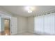 Bedroom with neutral walls, carpet, ceiling fan, and natural light at 2120 River Heights Se Walk, Marietta, GA 30067